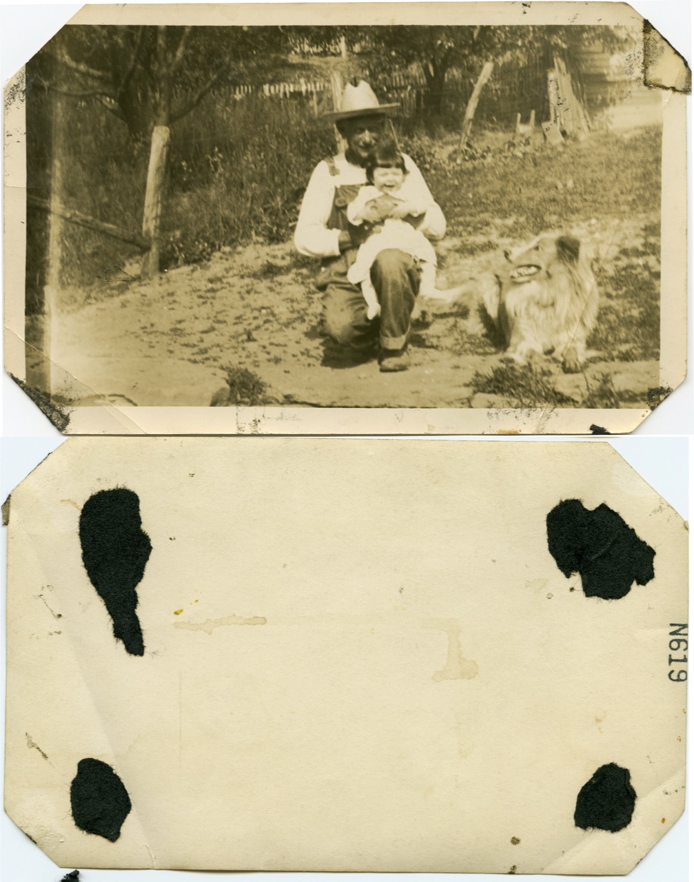 <b>Unknown-N619-Man-Baby-Dog</b><br><i>Unknown-N619-Man-Baby-Dog</i><br><i>Undated</i>